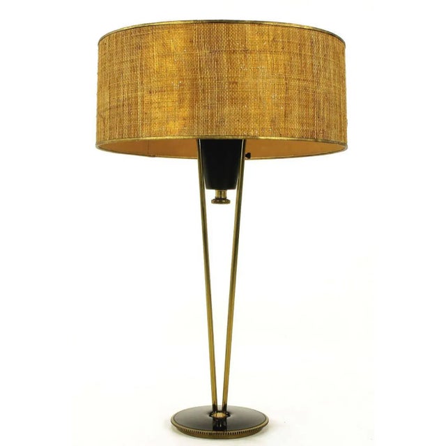 1950s Stiffel suspension table lamp. Four brass rods with ball finials support a black lacquered cup with internal light...