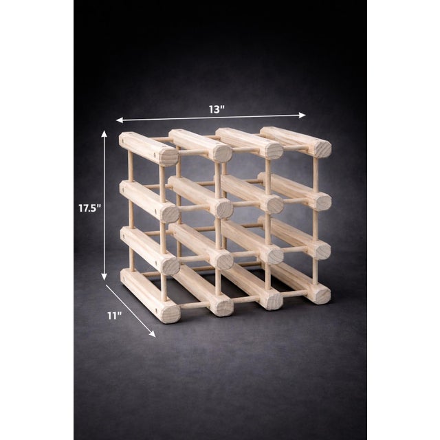 Solid wood 9-bottle wine rack with a soft whitewashed finish—perfect coastal storage piece with visible grain and...