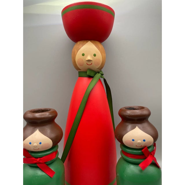 Three piece cheerful and colorful Swedish Christmas candle holders. Large solid wood female form for a pillar candle 11”...