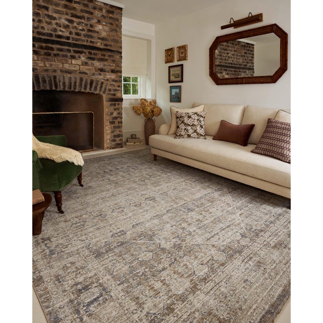 The Ida Collection from Chris Loves Julia x Loloi is a vintage-inspired area rug with a soft, subtly textured pile similar...