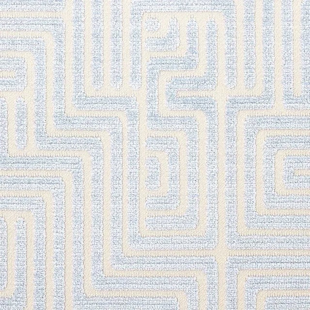 This unique, labyrinthine pattern was inspired by Portuguese tilework. Its winding, linear motif has a striking, large...