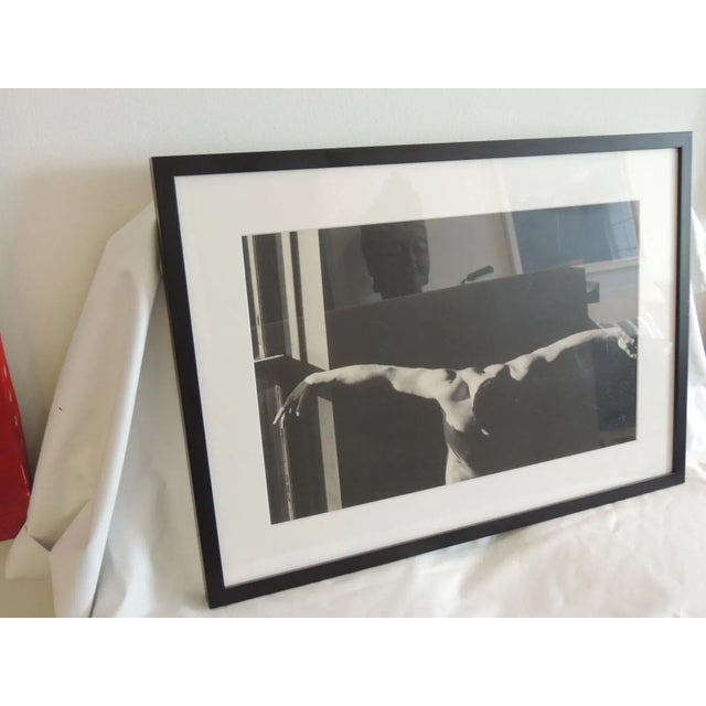 Framed Black & White Male Photograph "Open Arms" Framed on black wood frame and clear glass. White museum matting. 4/25 By...