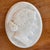19th century Italian oval white marble plaque carved with Aphrodite in profile, her wavy hair swept back into a soft knot...