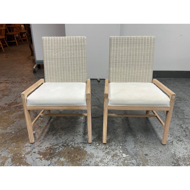 Design Plus Gallery presents a pair of Freeman Outdoor Armchairs from Palecek. Each chair is constructed with a teak wood...
