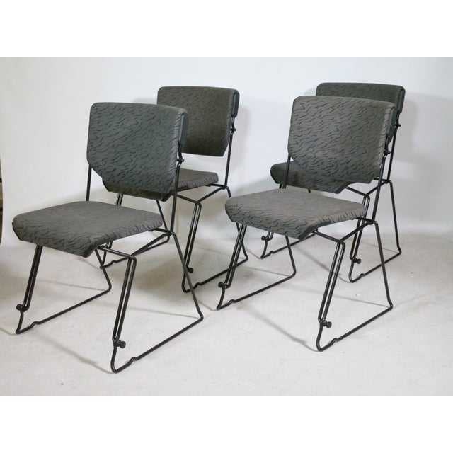 Stylish String metal fabric chair set by Albert Stoll for Giroflex from the 1980s. Black wire frame with stackable design...