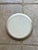 Hand-painted studio pottery plate with avalanche-lily motif, signed SBCD 2/81 SS. Good vintage condition.