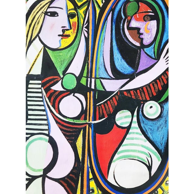 Offered is an unframed poster from The Museum of Modern Art (MoMA) in New York of Pablo Picasso's "Girl Before a Mirror",...