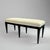 A fine Neoclassical style bench, six tapered legs in ebonized fruitwood, with a tight upholstered seat. An elegant and...
