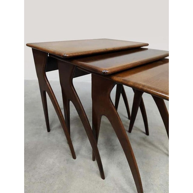Unique and rare vintage italian-style nesting tables. The designer is unknown. They are also reminiscent of the italian...