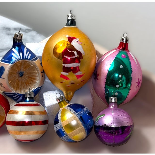 Set of ten (10) vintage mercury glass ornaments. Made in Poland and Germany, as many of their metal caps indicate, they...