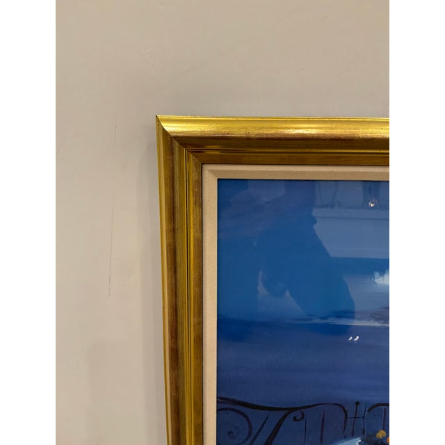 Alan Kingsbury Aegean Giclee Framed. Gold frame, person at cafe by the coast. Original retail $648. Showroom floor sample.