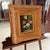 Framed, signed oil on canvas still-life painting depicting floral blooms in a vase. Lovely color and composition. Gold...