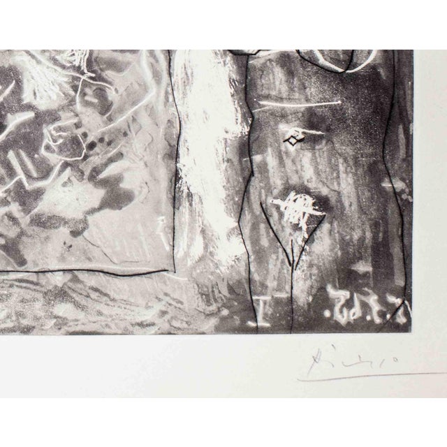 Complete Title: In the Studio (Painter at work with a large canvas and a standing model). Etching, aquatint and drypoint...