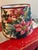 A washer top lampshade handmade with a charming floral and fauna motif. Measurements: top 10” bottom 14” side 10”