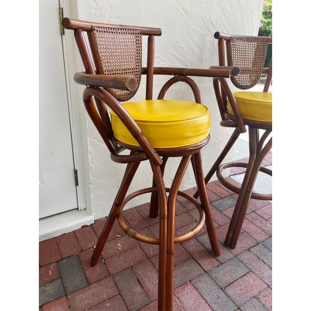 Mid-Century Modern Pair of Vintage Rattan Swivel Bar Stools With Naugahyde Seats For Sale - Image 3 of 7