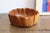 Large hand carved ribboned edge wooden bowl. Similar to Russel Wright's Oceana line of sculptural bowls and objects. Made...