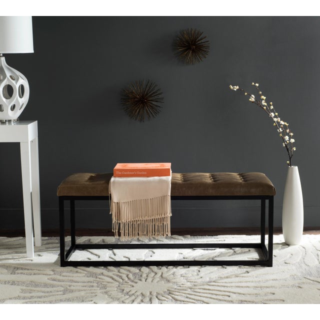 Graphic lines impart a designer look to the viewing bench, here with tan PU leather tufted upholstery and black Parsons-...