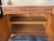 French antique oak washstand / vanity with a marble top, oval beveled mirror, and floral carvings. Excellent condition. No...
