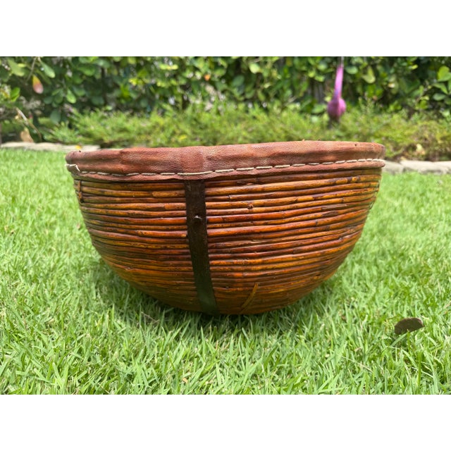 Contemporary Vintage 17.5” Handmade Primitive Pencil Rattan Basket With Leather Rim For Sale - Image 3 of 12