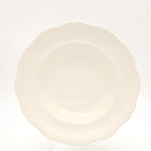 A set of eight Spode soup bowls in the Gadroon pattern, England circa 1900.