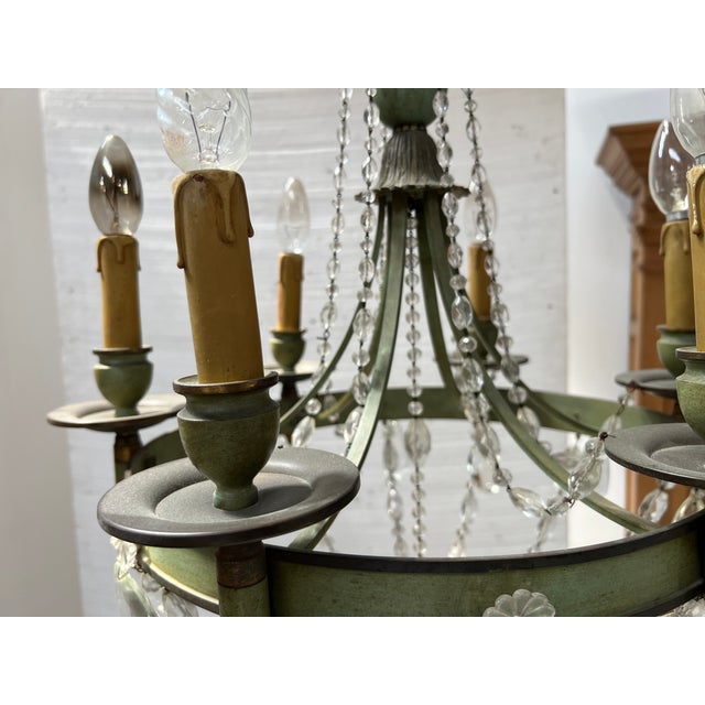 Empire style chandelier in patinated sheet metal with glass pendants Six lights Chandelier adorned with glass pendants and...