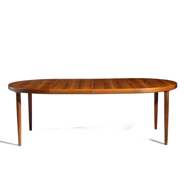 Mid Century Teak Dining Table with 2 Leaves This table measures: 47 wide x 47 deep x 28.75 inches high, with a chair...