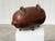 A striking vintage ceramic piece from the 1960s depicting a pig with generously rounded features. Its stocky body rests on...