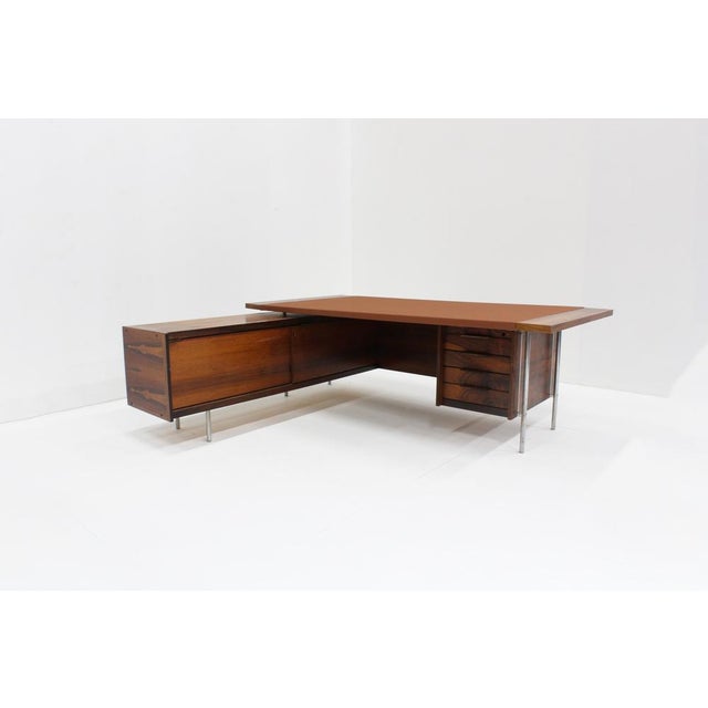 Vintage Mid-Century rosewood desk designed by Sven Ivar Dysthe for Dokka Mobler in the 1960s, Norway. The desk is made by...