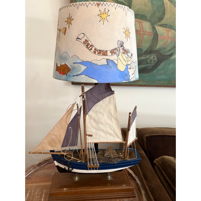 Vintage model ship from the 1970s that has been converted into a table lamp likely in the 1990s or 2000s. Complete with a...