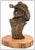 The artwork here, "Cowboy", is a remarkable depiction of a young boy in his finest hat, that is saturated with acute...