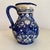 Beautiful vintage 1990s Italian hand painted blue ceramic pitcher with lemons and vines. In very good vintage condition...