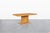 A stunning vintage dining table that exemplifies the sophisticated design aesthetic of the 1970s, this piece captures the...