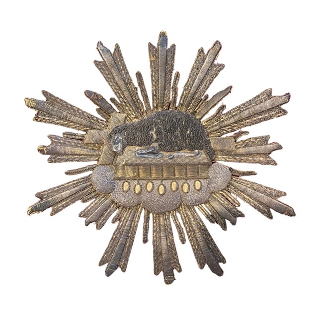 A remarkable 19th-century ecclesiastical velvet pillow featuring a raised Agnus Dei (Lamb of God) rendered in finely...
