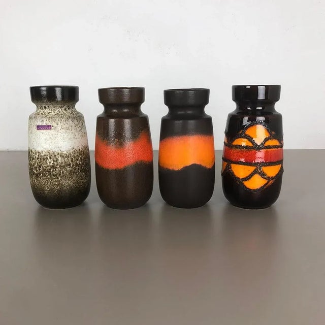Set of four fat lava art vases. Producer: Scheurich, Germany. Decade: 1970s. These original vintage vases was produced in...
