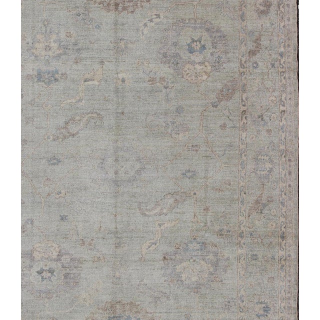 Keivan Woven Arts Angora Oushak Turkish Rug in Shades of Light Blue and Cream. Keivan Woven Arts / rug AN-120863 / country...