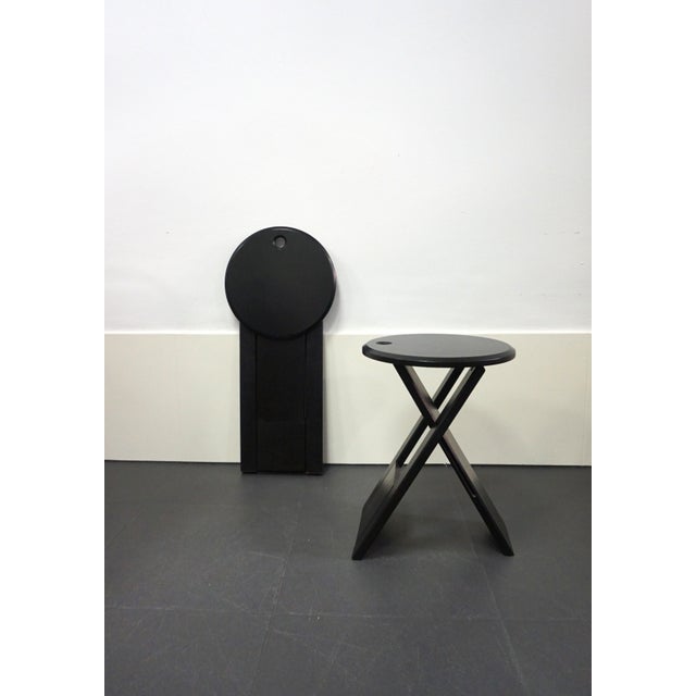 Pair of folding stools, Suzy model, designed by Adrian Reed. They can also be used as side tables. In good condition with...