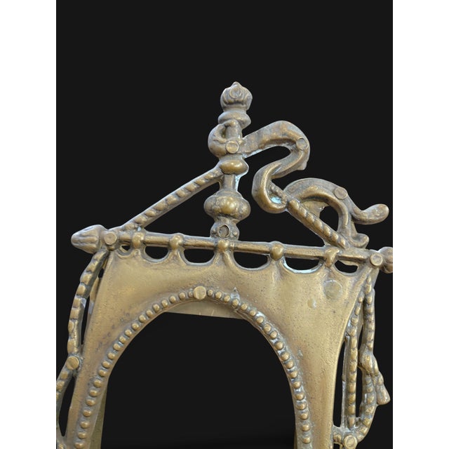 A gilt bronze photograph frame, decorated with figurative motifs in the Romantic style of the late 19th century. The mount...