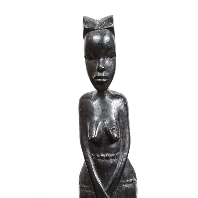 Decorative ebony well hand-carved African statue of a young women. Handmade in Kenya, Africa.