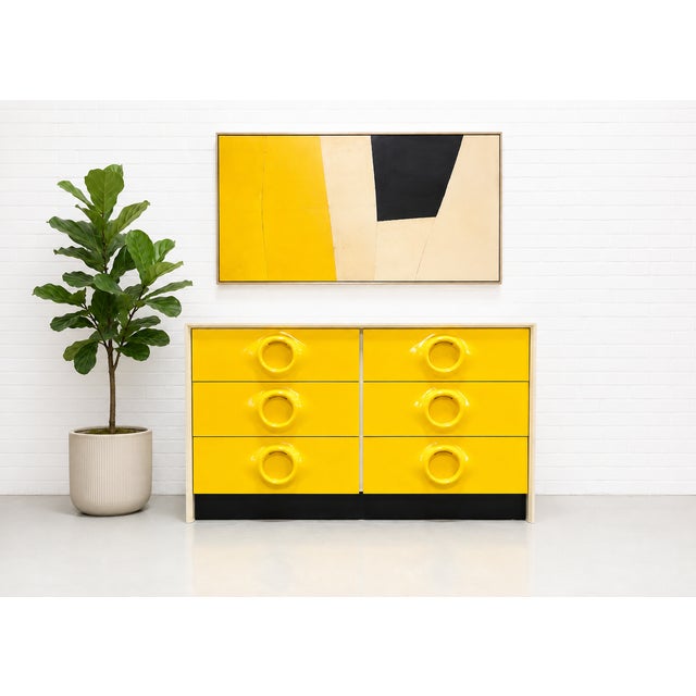 Extremely rare Mid Century Modern dresser in vibrant canary yellow, designed in the style of Raymond Loewy, c. 1960's....