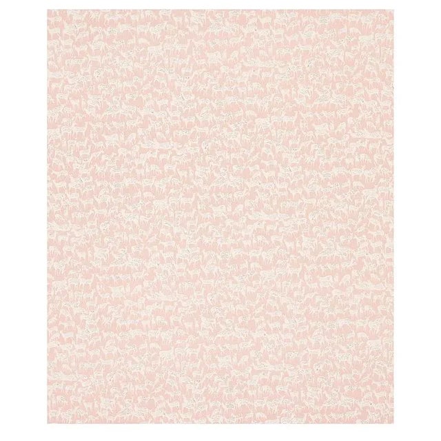 Miniature herds of hand-drawn deer, each with a distinct expression, give this small-scale and slate blue fabric design...