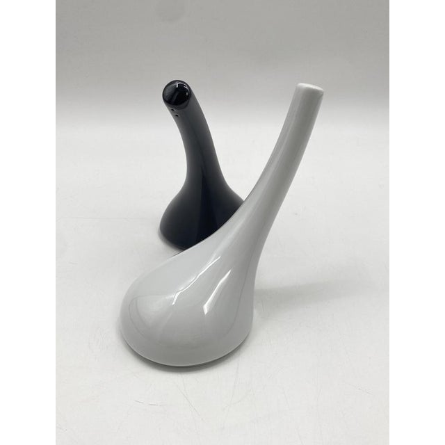 * a salt and a pepper shaker * Manufacturer: Rosenthal * Studio Line * Design: Ron Arad * Model: Calebassa * Material:...
