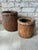 Pair of small scale rustic Chinese woven baskets featuring a rich, dark patina and thick braided rolled rims. The texture...