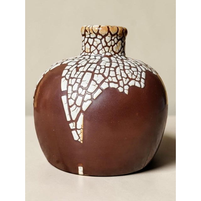 "Snakeskin" stoneware vase, Léon Pointu, Art Deco Beautiful spherical vase in glazed stoneware, with a narrow, slightly...