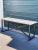 Cool console from Timothy Oulton with heavy duty iron base. Reclaimed unfinished lighter colored wood with nice character....