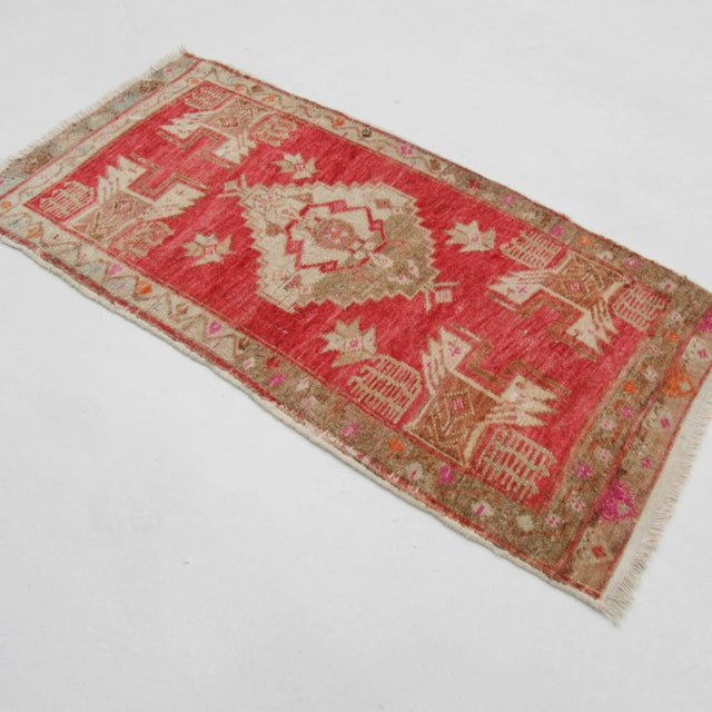 Vintage handknotted decorative mini rug from Konya region of Turkey. Approximately 50-60 years old. In very good condition.