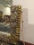This late 1920s French Art Deco mirror sparkles. The frame, with its leaves and flower heads and geometric motif. The...