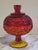 This gorgeous amberina transitions from firey red to and orange glow and a mellow yellow color. It has the classic lidded...