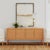 Introducing the Captiva Rattan 4-Door Sideboard, where coastal charm meets functional beauty. With its wood frame...