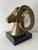 Mid century bronze rams head on black marble base. Striking addition to almost any decor-Hollywood regency, mid century or...