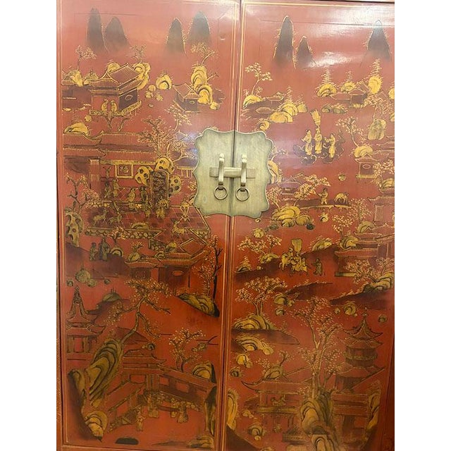 Shanxi Hand Painted Tall Cabinet is made out of elm. It has 2 Doors, 2 drawers and 3 removable shelves. It has a lot of...